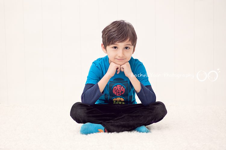photo of a boy with white backdrop