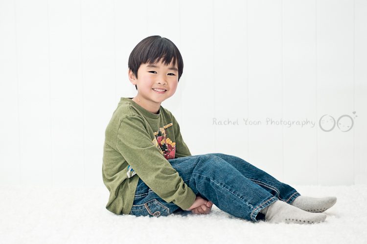 photo of a boy with a white backdrop