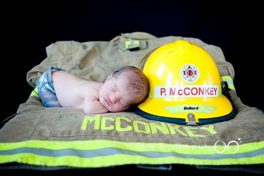 newborn photography vancouver - baby girl fire fighter prop