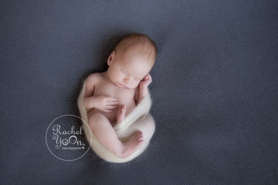 newborn baby on a bean bag- Newborn Photography Vancouver