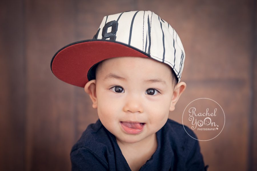 baby boy with a baseball cap - baby photography vancouver