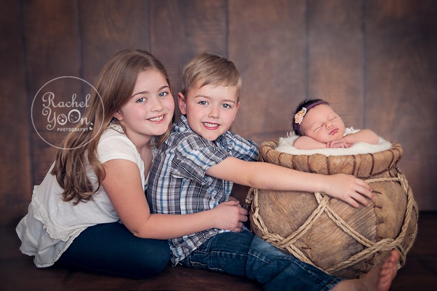 newborn baby girl with siblings - newborn photography vancouver