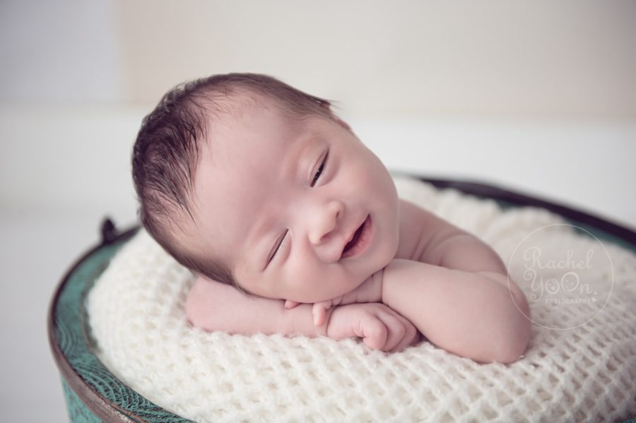 newborn baby girl smiling - newborn photography vancouver