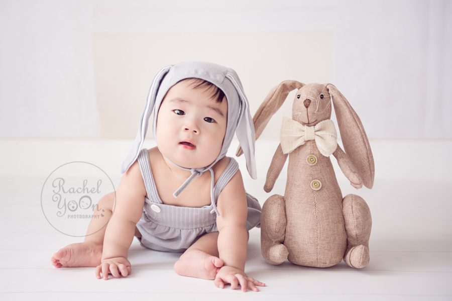 6 months old baby boy in a rabbit outfit - baby photography vancouver