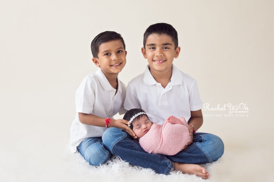 newborn baby girl with big brothers - newborn photography vancouver
