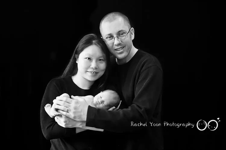 newborn baby with parents