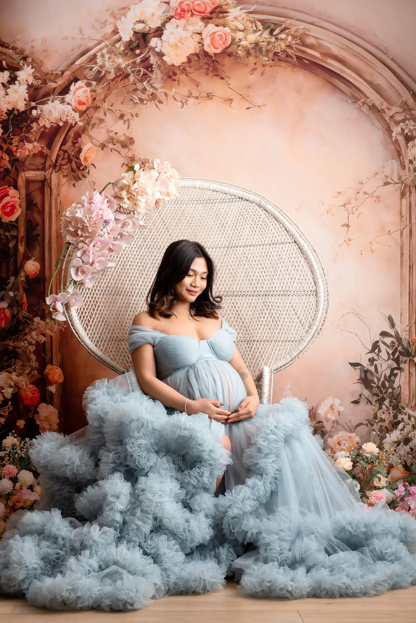 maternity photography with blue ruffle dress