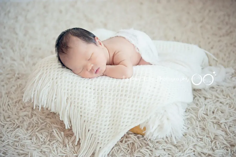 newborn photography vancouver - newborn baby boy in a basket