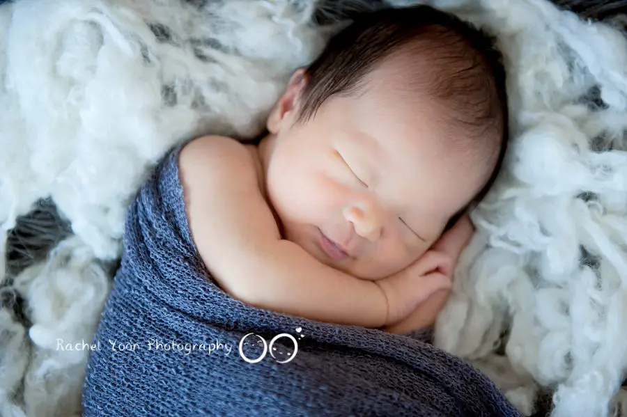 newborn photography vancouver - newborn baby boy in a basket