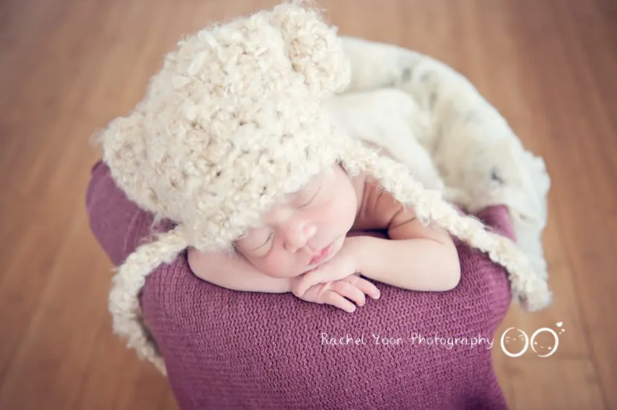 newborn photography vancouver - newborn baby boy in a bucket
