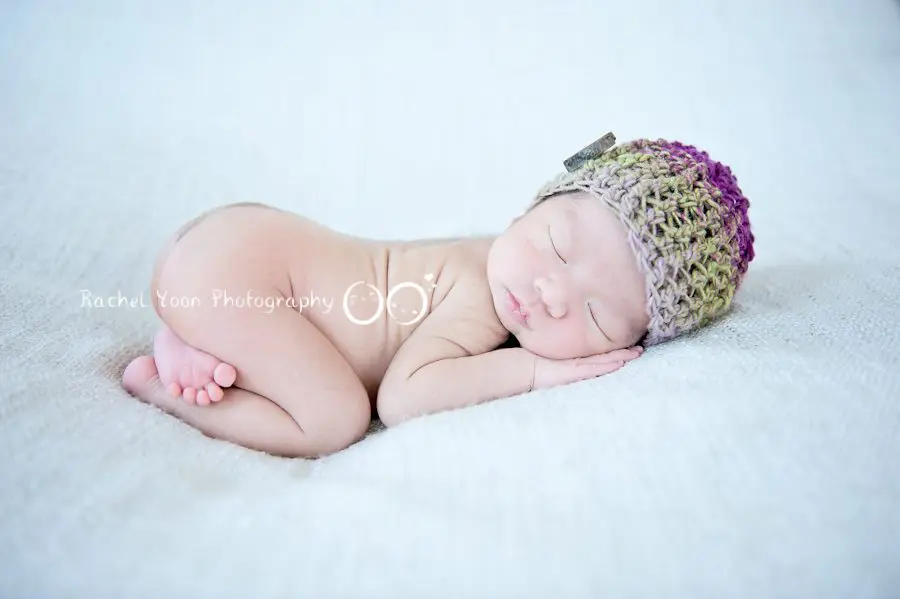 newborn photography vancouver - newborn baby boy on a beanbag