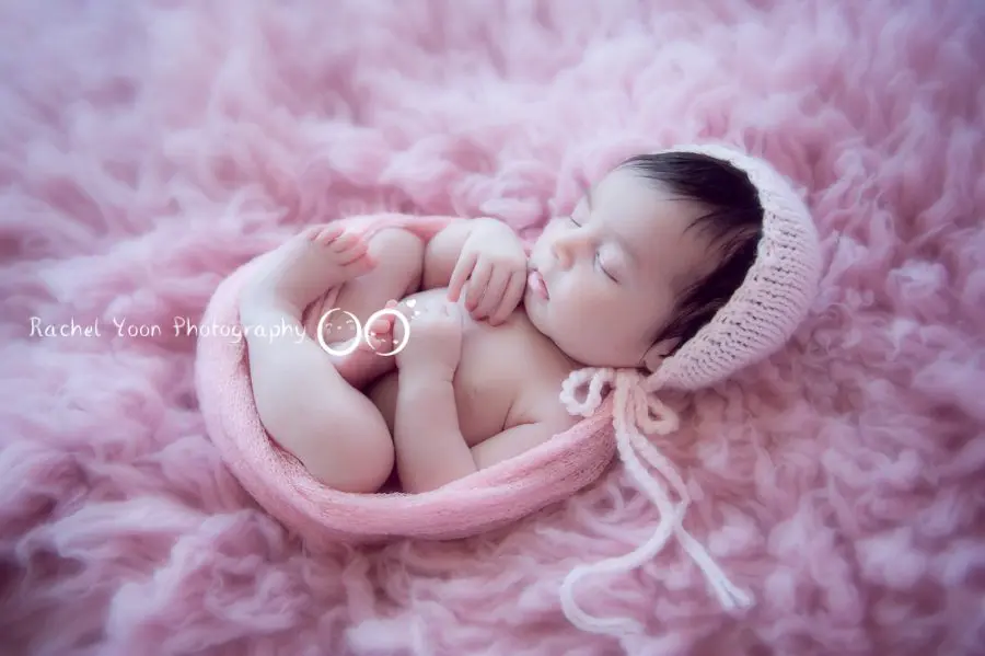 newborn baby girl wrapped in pink - newborn photography vancouver
