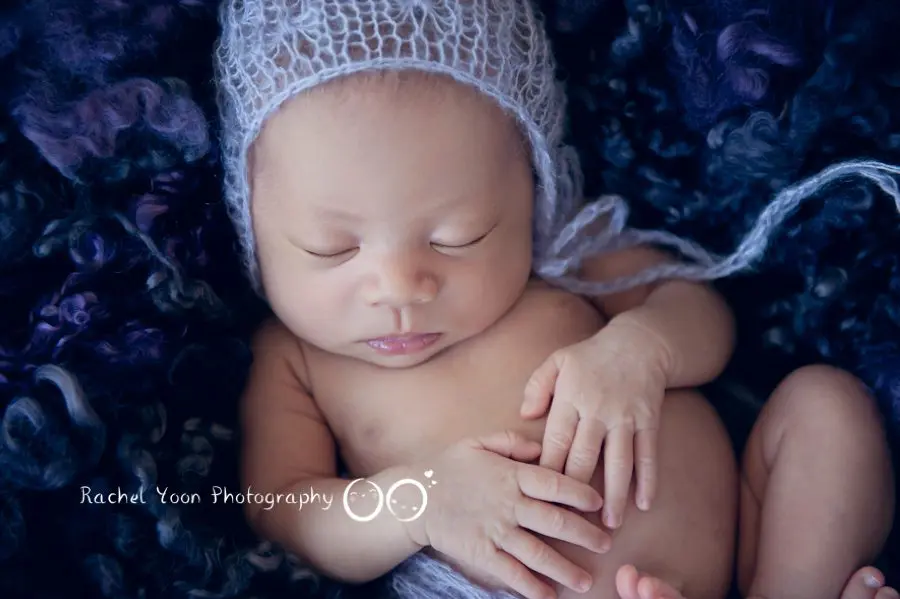 newborn baby girl in a basket - newborn photography vancouver