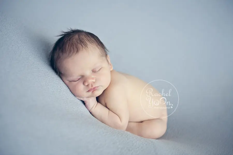 newborn baby boy on a beanbag - newborn photography vancouver