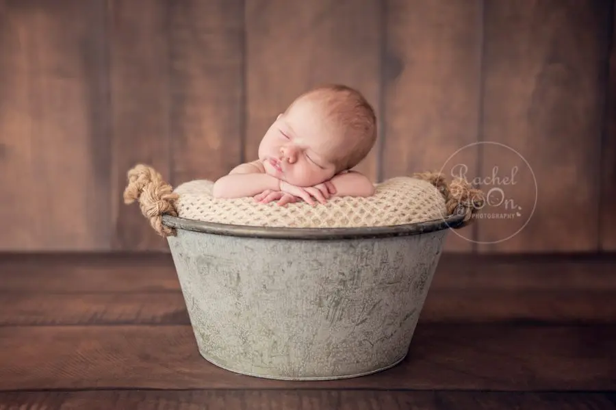 newborn baby in a metal bucket - Newborn Photography Vancouver