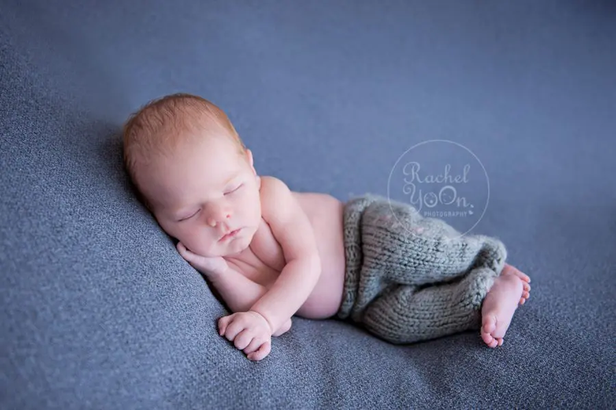 newborn baby on a bean bag - Newborn Photography Vancouver