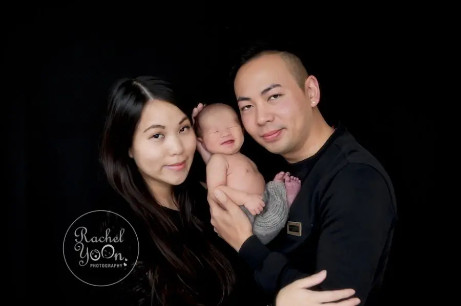 newborn baby boy with mom and dad - Newborn Photography Vancouver