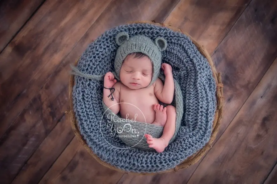 newborn baby boy in a basket - newborn photography vancouver