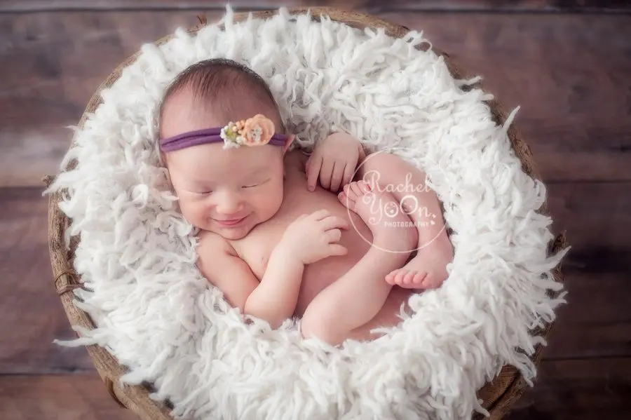 newborn baby girl in a basket - newborn photography vancouver