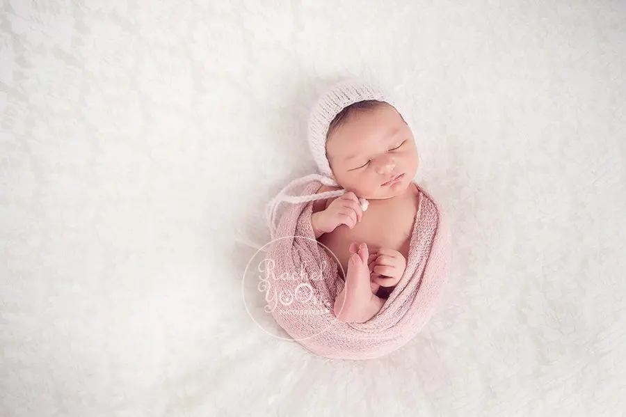 newborn baby girl wrapped in pink - newborn photography vancouver