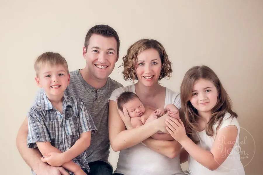 newborn in family photo - newborn photography vancouver