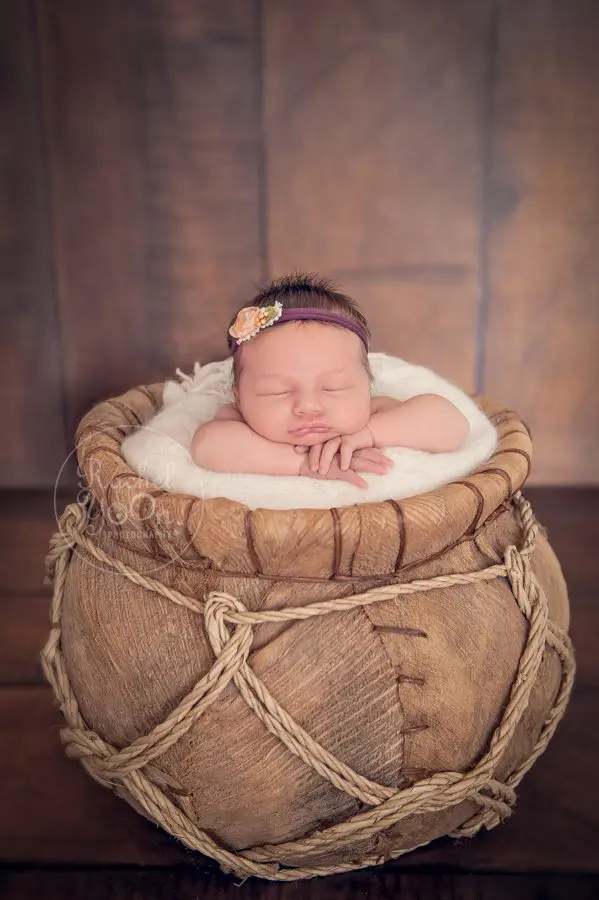 newborn baby girl in a basket - newborn photography vancouver