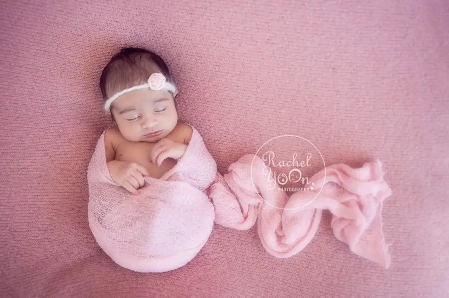newborn baby girl wrapped in pink - newborn photography vancouver