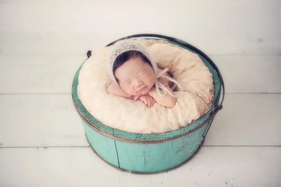 newborn baby girl in a basket - newborn photography vancouver