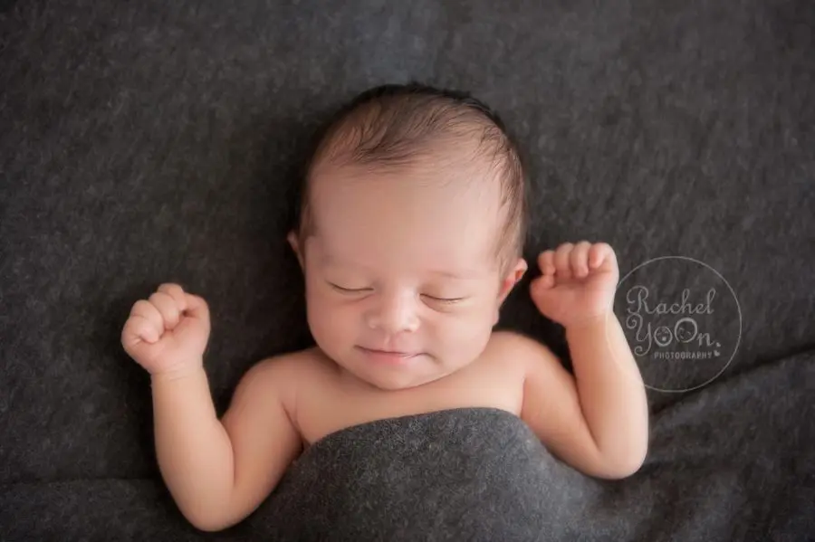 newborn baby boy on a beanbag - newborn photography vancouver