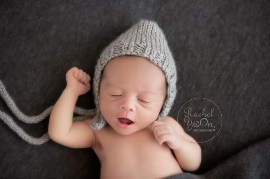 newborn baby boy on a beanbag - newborn photography vancouver
