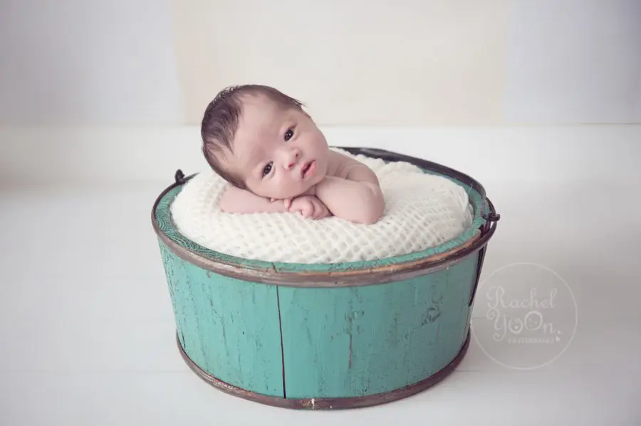 newborn baby girl in a basket - newborn photography vancouver