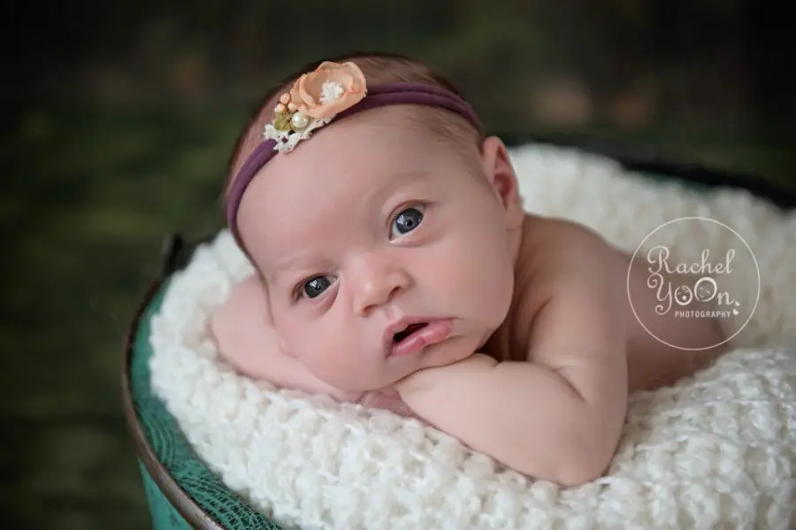 newborn baby girl with open eyes - newborn photography vancouver