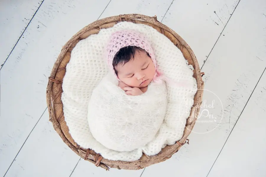 newborn baby girl in a basket - newborn photography vancouver