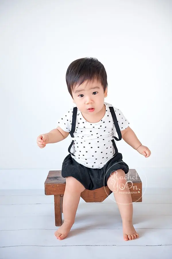 1 year old baby boy on a bench - baby photography vancouver