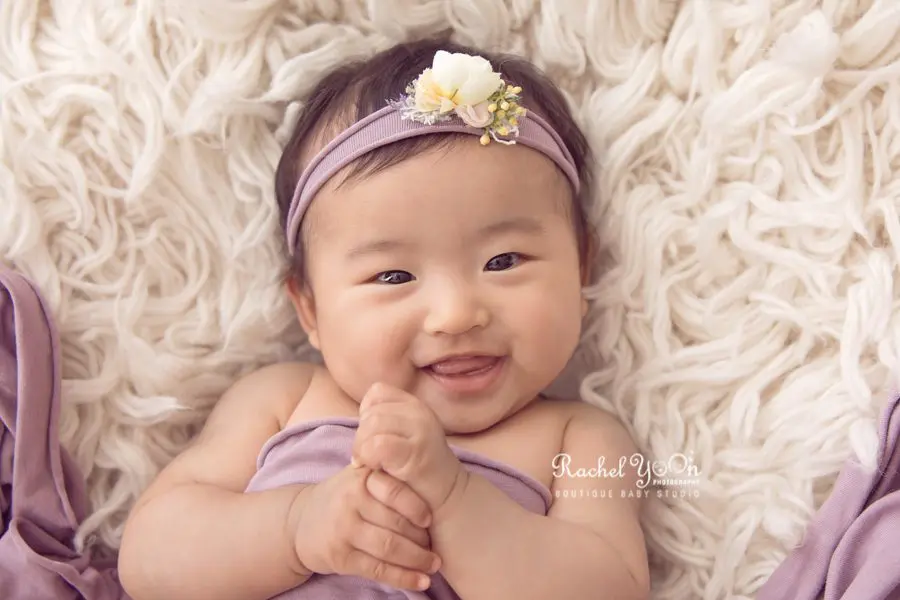 100 days old baby smiling