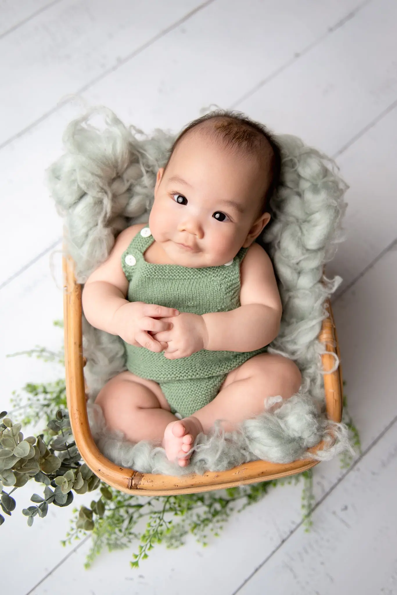 baby boy in a basket - 100 days session