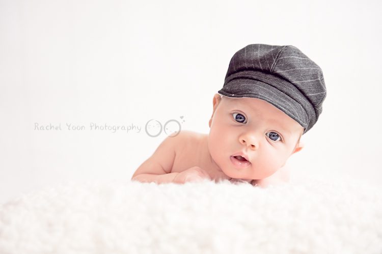 two months old baby boy with a hat