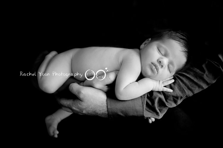 newborn baby girl in black and white