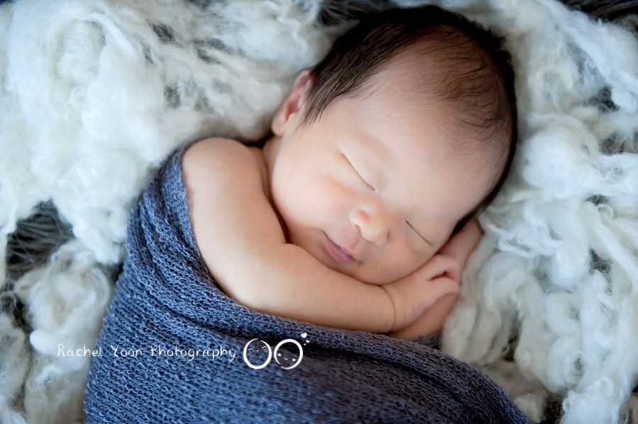 newborn photography vancouver - newborn baby boy in a basket