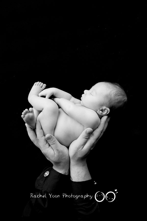 newborn photography vancouver - baby boy in dad's hands