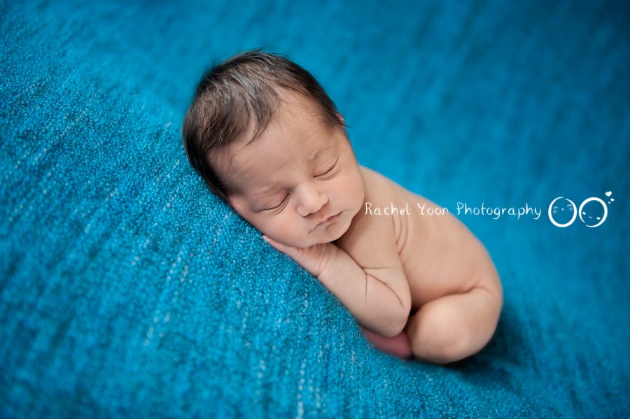 newborn photography vancouver - newborn baby boy on a beanbag