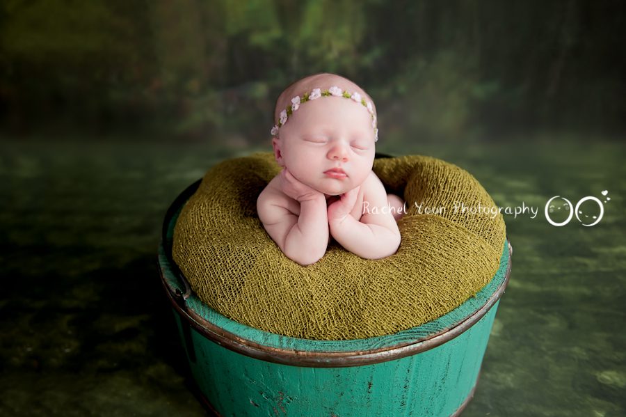 newborn photography vancouver- baby girl froggy pose in a bucket