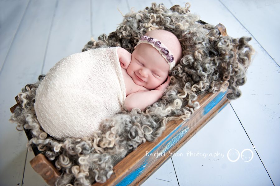 newborn photography vancouver- baby girl smiling