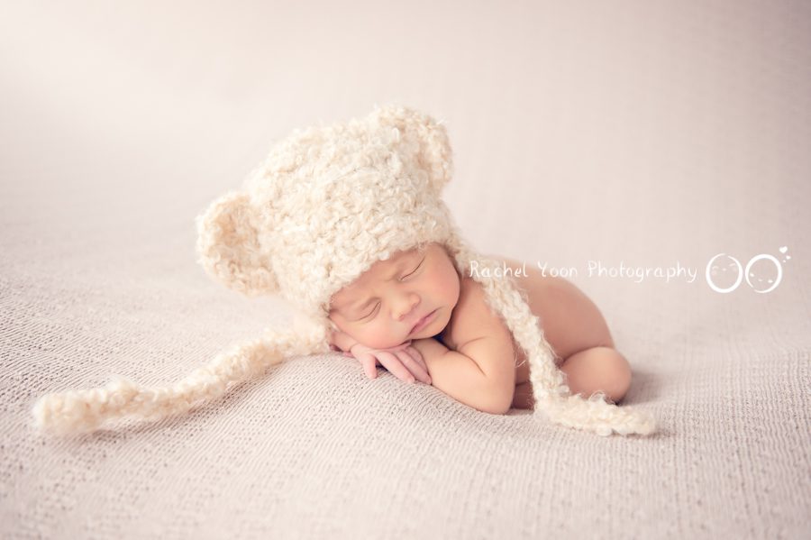 newborn photography vancouver - newborn baby boy with a bear hat