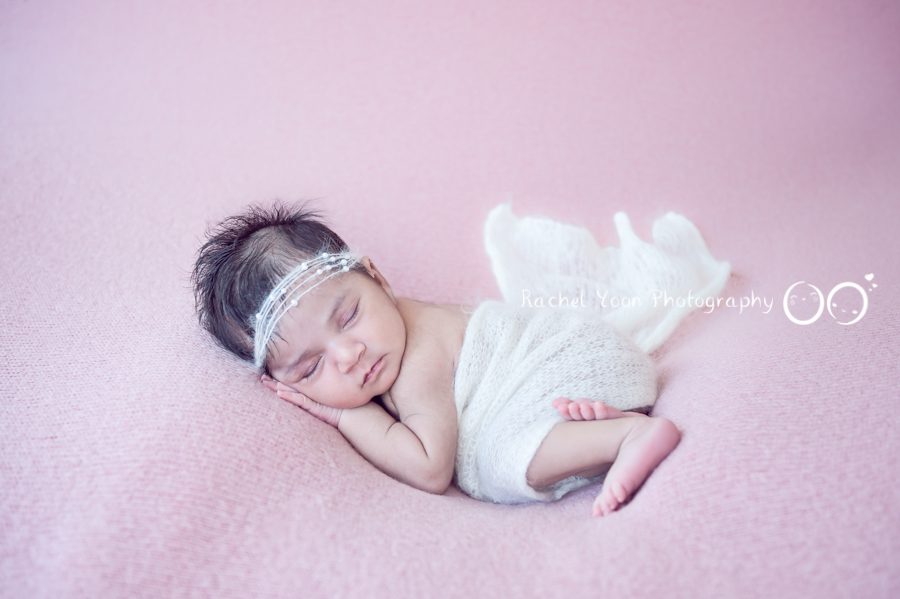 newborn baby girl lying on her side - newborn photography vancouver