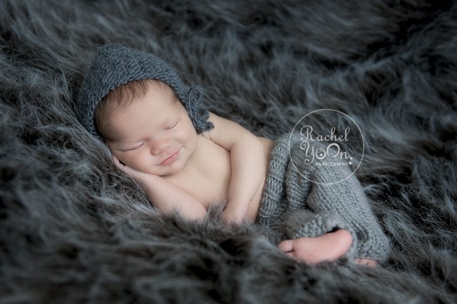 newborn baby boy on a beanbag - newborn photography vancouver