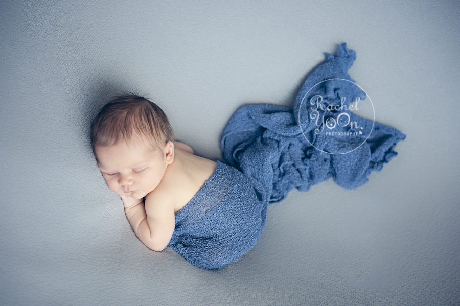 newborn baby boy on a beanbag - newborn photography vancouver