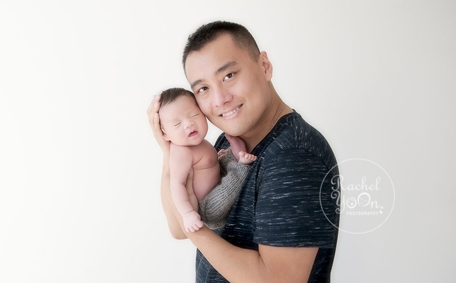 newborn baby boy with dad - Vancouver Newborn Photographer