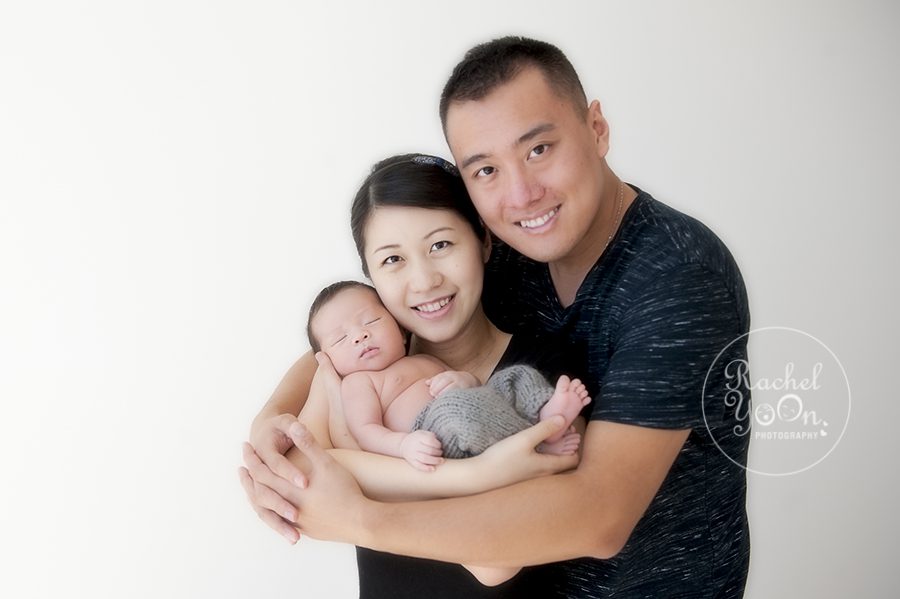 newborn baby boy with mom and dad - Vancouver Newborn Photographer