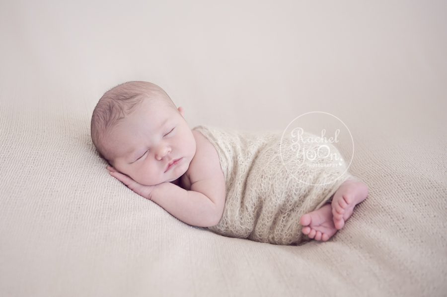 newborn baby girl on the side post - Vancouver Newborn Photography